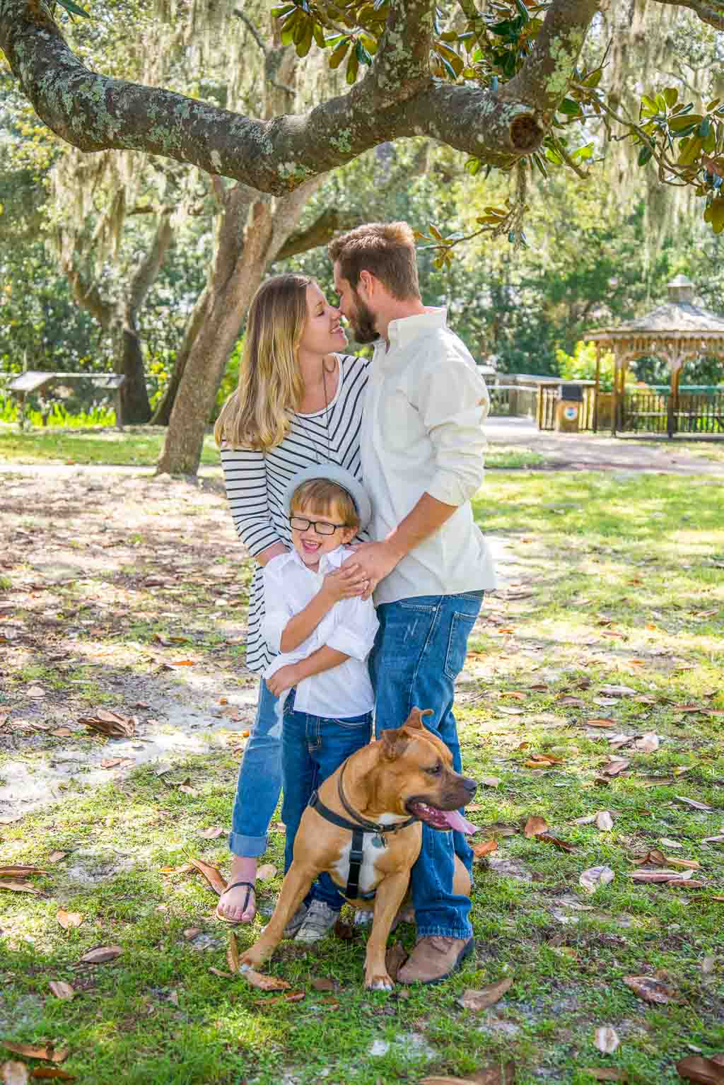 Family photo session with dog in Destin, Florida park